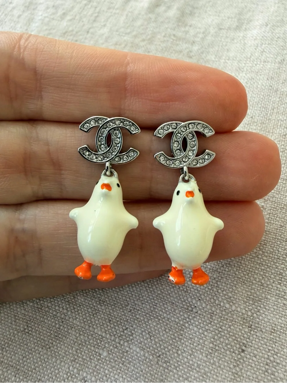 CHANEL White Enamel Chicken CC Drop Earrings with Orange Accents